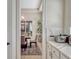 Elegant dining room view from pantry, featuring stylish decor and ample natural light at 8047 Chilton Dr, Orlando, FL 32836