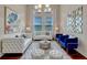 Bright living room with plush seating, modern decor, and natural light, creating a cozy and stylish space at 8047 Chilton Dr, Orlando, FL 32836