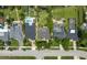 Street view of neighborhood showcases well-maintained homes, mature trees and manicured lawns at 8473 Granada Blvd, Orlando, FL 32836