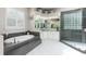 A modern bathroom with a glass shower and a separate soaking tub and lots of storage at 8704 Ingleton Ct, Orlando, FL 32836