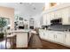 Open floor plan featuring a large kitchen island and seamlessly connected living spaces at 8704 Ingleton Ct, Orlando, FL 32836