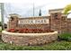 Elegant stone sign marking the entrance to the Bristol Park community at 8704 Ingleton Ct, Orlando, FL 32836
