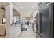Bright kitchen featuring granite countertops, stainless steel appliances, and a view of the dining area at 9426 Burnam Dr, Weeki Wachee, FL 34613