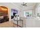 Inviting living room boasts natural light, stylish decor, and a seamless transition to the outdoor area at 9426 Burnam Dr, Weeki Wachee, FL 34613