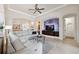 Spacious living room featuring an open layout, modern decor, and abundant natural light at 9426 Burnam Dr, Weeki Wachee, FL 34613