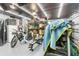 Garage transformed into a home gym with organized storage and workout equipment at 9774 Bohart Ct, Orlando, FL 32836