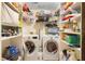 Organized laundry room featuring a modern washer and dryer set at 9774 Bohart Ct, Orlando, FL 32836