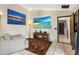 Living Room featuring a large flat screen TV and a cozy couch and a decorative rug at 9774 Bohart Ct, Orlando, FL 32836