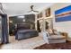 This main bedroom features unique modern decor, tiled floors, ample natural light and a sitting area at 9774 Bohart Ct, Orlando, FL 32836