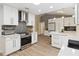 Bright kitchen with stainless appliances, ample cabinets, and sleek countertops for a modern culinary experience at 1008 Jackson Creek Ct, Oviedo, FL 32765