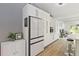 Modern kitchen featuring stainless steel appliances, ample cabinet space, and an open layout at 1008 Jackson Creek Ct, Oviedo, FL 32765