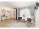 Open-concept living room with wood floors, stylish furnishings, and an airy atmosphere at 1008 Jackson Creek Ct, Oviedo, FL 32765