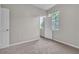 Neutral bedroom featuring carpet flooring, light walls, and two windows at 10836 Tilston Pt, Orlando, FL 32832
