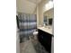 Functional bathroom featuring a single vanity, modern fixtures, and a shower-tub combination at 11097 N Folklore St, Winter Garden, FL 34787