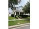 Charming two-story home with a well-manicured lawn and curb appeal at 11097 N Folklore St, Winter Garden, FL 34787