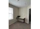 Cozy home office with natural light, a built-in desk, and plush carpeting at 11097 N Folklore St, Winter Garden, FL 34787