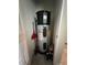 A modern A.O. Smith water heater is tucked neatly in the closet of the home at 11097 N Folklore St, Winter Garden, FL 34787