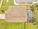 Aerial view of the roof and screened in pool at 13404 Bradwater Ct, Orlando, FL 32828