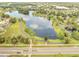 Aerial view of the community with walking paths around the lake at 13404 Bradwater Ct, Orlando, FL 32828