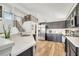 Kitchen with stainless steel appliances, quartz countertops, and dark cabinetry at 13404 Bradwater Ct, Orlando, FL 32828