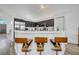 Kitchen view of breakfast bar, cabinetry, and stainless steel appliances at 13404 Bradwater Ct, Orlando, FL 32828