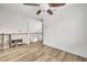Spacious open loft area upstairs with lots of natural light, wood floors, and modern fixtures at 13404 Bradwater Ct, Orlando, FL 32828