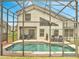 A serene screened-in pool and outdoor living space offer a perfect spot for relaxation and recreation at 13404 Bradwater Ct, Orlando, FL 32828