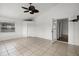 A sunny sun room features tile floors, a ceiling fan, a closet, and access to the outside at 142 Stonegate Pass, Davenport, FL 33897