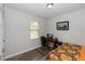 Cozy bedroom featuring carpet flooring, a window view and neutral colors at 1431 Leitrim Loop, Apopka, FL 32703