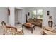 Inviting living room showcases ornate furniture, tile flooring and an entry view at 1431 Leitrim Loop, Apopka, FL 32703