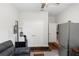 Office/Living Room with ample closet space, desk and comfortable seating area, and a ceiling fan at 1431 Leitrim Loop, Apopka, FL 32703