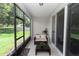 Relaxing screened patio with comfortable seating area and view of the backyard at 1431 Leitrim Loop, Apopka, FL 32703