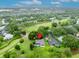 Beautiful aerial view of a well-maintained home overlooking a golf course at 1507 Golfside Dr, Winter Park, FL 32792