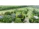 A well maintained home with a pool, surrounded by mature trees and landscaping adjacent to golf course at 1507 Golfside Dr, Winter Park, FL 32792