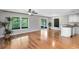 Bright living room featuring hardwood floors and natural light at 15324 Black Lion Way, Winter Garden, FL 34787