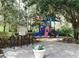 Fun playground area with colorful equipment for children to enjoy outdoors at 15483 Avenue Of The Arbors, Winter Garden, FL 34787