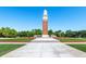 Community town center showing clock tower, gardens, flowers and meticulous landscaping at 15483 Avenue Of The Arbors, Winter Garden, FL 34787