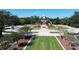 Community features include town center with clock tower and gardens in a park-like setting at 15483 Avenue Of The Arbors, Winter Garden, FL 34787