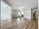 Spacious bedroom featuring wood flooring and neutral walls at 2005 Compass Flower Way, Ocoee, FL 34761