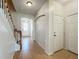 Hallway with tile flooring, staircase, and closet at 2005 Compass Flower Way, Ocoee, FL 34761