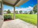 Spacious patio overlooking lush green common area at 2005 Compass Flower Way, Ocoee, FL 34761