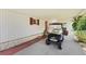 Spacious carport featuring a golf cart at 2060 Lamplight Cir, Mount Dora, FL 32757