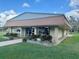 Charming hospitality house with lush landscaping and welcoming entrance at 2060 Lamplight Cir, Mount Dora, FL 32757
