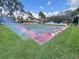 Enjoy outdoor shuffleboard courts, perfect for active community living and recreation at 2060 Lamplight Cir, Mount Dora, FL 32757