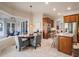 Open kitchen with stainless steel appliances, granite countertops, and eat in kitchen nook at 2106 Ridgewind Way, Windermere, FL 34786
