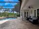 Outdoor pool area featuring a screened enclosure and ample patio space at 2106 Ridgewind Way, Windermere, FL 34786