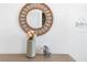 Stylish interior decor with mirror, vase, and decorative fish at 2363 Lancashire St, Davenport, FL 33896