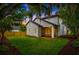 This home boasts a large, lush backyard with a covered patio, perfect for outdoor entertaining and relaxation at 2607 Lafayette Ave, Winter Park, FL 32789