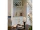 Charming bar area features a wine rack, sink, and elegant decor for entertaining guests at 2607 Lafayette Ave, Winter Park, FL 32789
