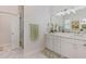 Bright bathroom with glass shower and double vanity at 2607 Lafayette Ave, Winter Park, FL 32789